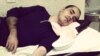 Hossein Ronaghi has been transferred to a hospital after refusing to eat for 64 days, his father said.