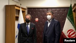 Шефот на атомската агенција на Обединетите нации Рафаел Гроси и Мохамад Еслами, шефот на иранската Организација за атомска енергија.