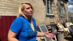 Supraviețuitorii distrugerii barajului Kahovka din Ucraina încearcă să-și salveze amintirile și viitorul