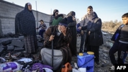 Палестинско семейство, попаднало под обстрел на израелската армия