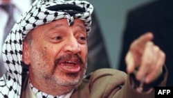 Ясер Арафат, лидер на Организацията за освобождение на Палестина, на пресконференция в Женева, 1988 г.