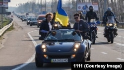 Катерина Бутко (лево) на протестот на Автомајдан во март 2014 година