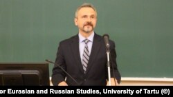 Vyacheslav Morozov opens a conference at the University of Tartu in 2017. 