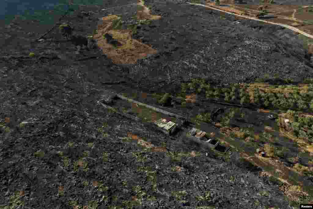 Još jedan požar oslabio je 18. jula, nakon što je izbio dan ranije u selu Kouvaras, oko 27 kilometara jugoistočno od Atine.