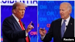 Candidatul republican la președinție, fostul președinte al SUA, Donald Trump, și candidatul la președinția Partidului Democrat, președintele american Joe Biden, vorbesc în timpul unei dezbateri prezidențiale din Atlanta, Georgia, SUA, 27 iunie 2024.