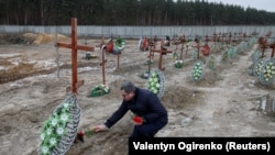 Илустрација, одбележување на една година од масакрот во Буча 