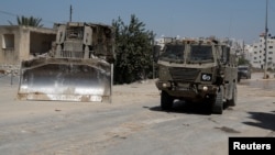 Izraelsko vojno vozilo u prethodnoj raciji u Tulkarimu, 22. avgust 2024.