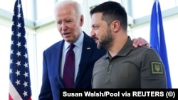 Ukrainian President Volodymyr Zelenskiy (right) with U.S. President Joe Biden during the G7 summit in Japan in May. “I think Ukraine is going to be even more of a domestic election issue than it was in 2020,” one Washington lobbyist says. 