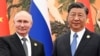 Liderii rus și chinez, Vladimir Putin și Xi Jinping. 