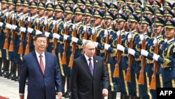 Hszi Csin-ping és Vlagyimir Putyin a kínai fővárosban 2024. május 16-án