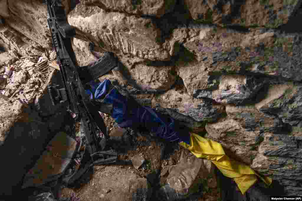 A Ukrainian flag and a rifle in a bunker near&nbsp;Andriyivka. Ukrainian President Volodymyr Zelenskiy is making his country&#39;s case to Washington and to the world this week for more money and more weapons and must persuade his audience that the counteroffensive is working. The U.S. Congress is currently weighing President Joe Biden&rsquo;s request&nbsp;to provide as much as $24 billion more in military and humanitarian aid.
