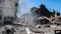 Ndërtesa të rrënuara nga lufta izraelite në Rripin e Gazës, 9 maj 2024.