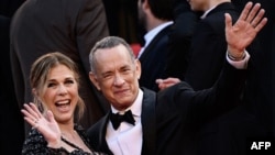 Рита и Тома на прожекцията на филма „Asteroid City“ по време на 76-ото издание на филмовия фестивал в Кан, на 23 май 2023 г.