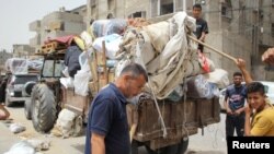 Stanovništvo se priprema za evakuaciju, nakon što su izraelske snage pokrenule kopnenu i zračnu operaciju u istočnom dijelu Rafaha, 11. maja 2024.