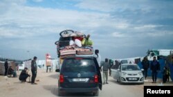 Palestinci napuštaju grad Rafah u strahu od vojne operacije izraelske vojske u jeku tekućeg konflikta sa militantima Hamasa, 13. februar 2024.