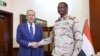 Ministrul rus de externe, Serghei Lavrov (stânga), și vicepreședintele Consiliului Suveran de Tranziție, generalul Mohamed Hamdan Dagalo. Khartoum, Sudan, 9 februarie 2023