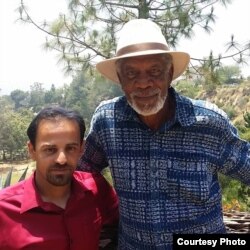 Izidor alături de actorul Morgan Freeman (2017).