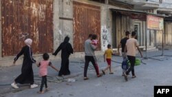 Palestinezët duke u larguar nga shtëpitë e tyre në Rripin e Gazës. 18 tetor 2023.