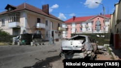 Згради и возило оштетени од нападите во Шебекино.