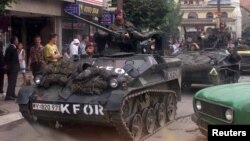 Силите на мировната мисија на НАТО(КФОР) влегоа во Призрен во југоисточно Косово на 16 јули 1999 година