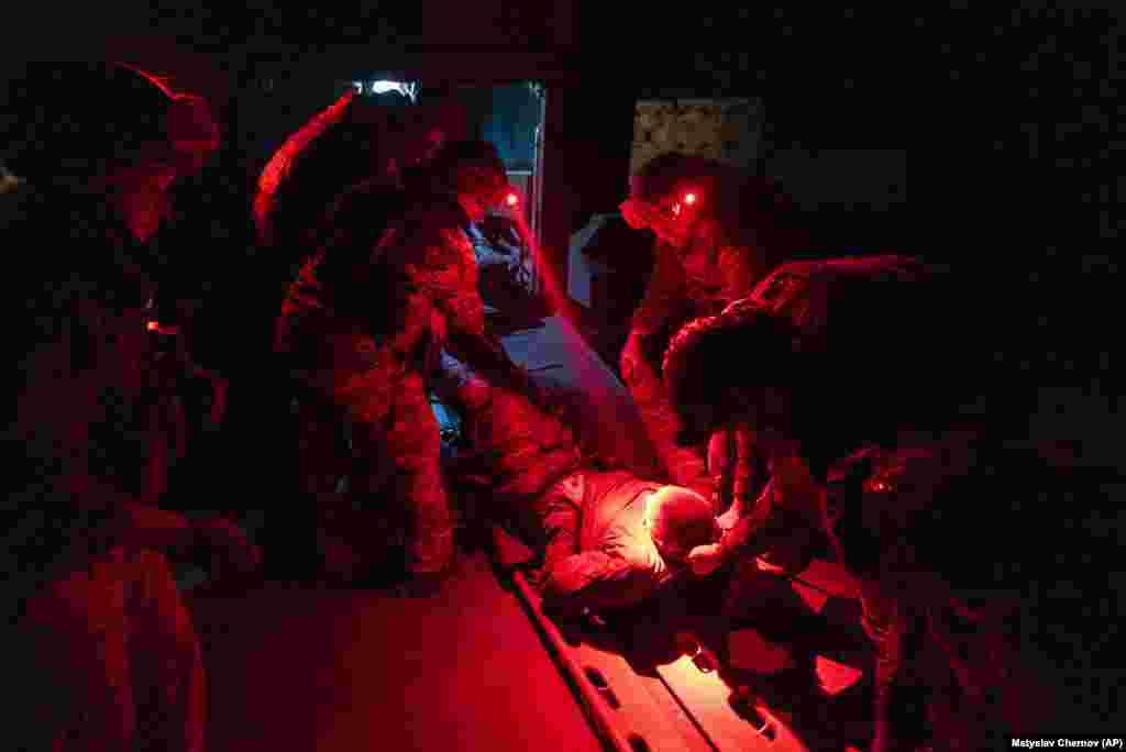 Ukrainian paramedics carry a wounded comrade injured during fighting near Andriyivka. The brigade&#39;s two-month battle to fight its way through a charred forest and entrenched enemy positions shows the challenges of Kyiv&#39;s counteroffensive in the east and south.&nbsp;