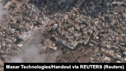 A műholdfelvételen a gázai al-Ahli kórház látható, miután kedd este palesztinok százai vesztették életüket egy robbantásban, amelyért az izraeliek és a palesztinok egymást hibáztatják. 2023. október 18.