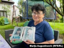 Ana Grebenar sa fotografijama ubijenih mališana Augustine i Velimira