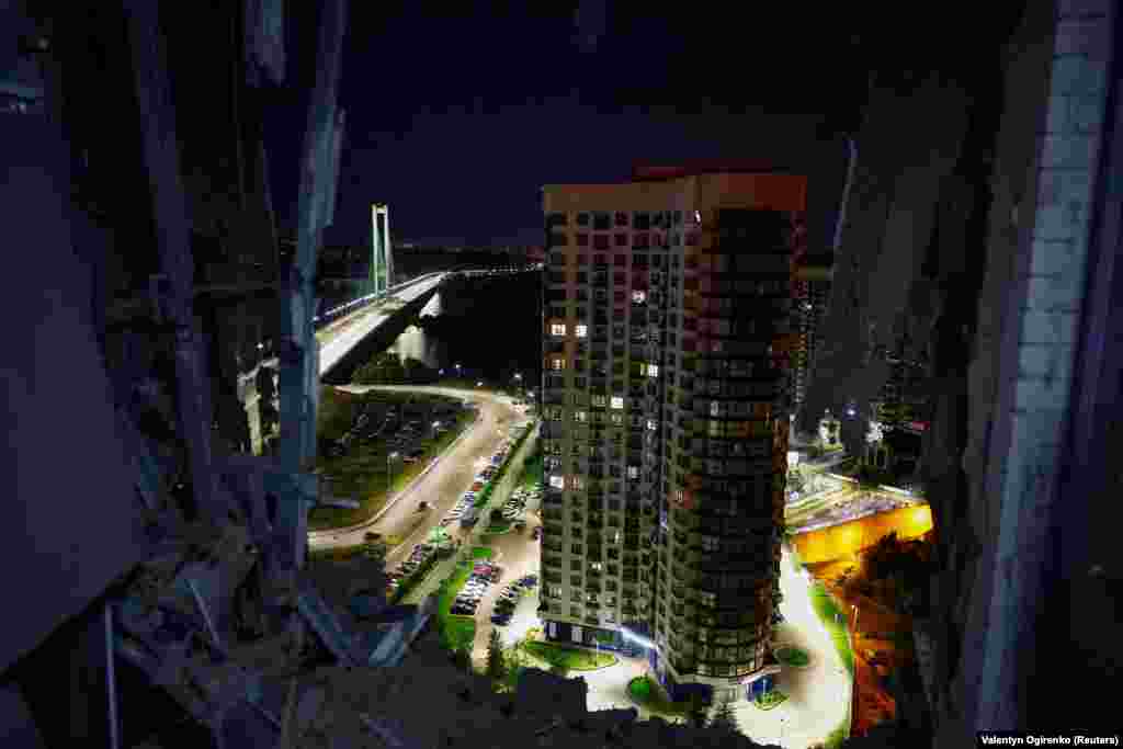 A residential building is seen from a damaged apartment.&nbsp; The head of Kyiv&#39;s military administration, Serhiy Popko, described the assault as a &quot;mass attack&quot; by Iranian-made Shahed drones that had approached from different directions.