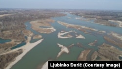 Šljunkare na Drini nastale zbog eksploatacije šljunka, Bosna i Hercegovina, selo Amajlije - Bijeljina, februar 2024. 