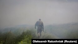 Contraofensiva continuă | Steagul ucrainean a fost arborat într-o localitate eliberată 