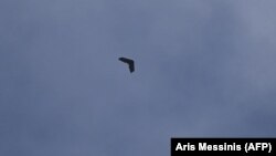 Një dron duke fluturuar mbi Bahmut, në Ukrainë më 20 mars 2023.