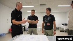 Студеникин како официјален претставник на OЗХО во Тунис, октомври 2010 година.