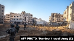 Soldați israelieni în Fâșia Gaza, într-o fotografie publicată la 1 ianuarie de armata israeliană (Foto: AFP)