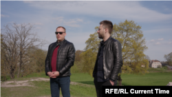 Modris Skudra (stânga)