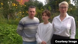 Yegor with father Daniel ad mother Tatyana