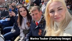 Олигарх Илан Шор с башканом Гагаузии Евгенией Гуцул и депутатом Мариной Таубер на параде по случаю 9 мая в Москве, 2024 года.