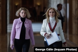 Gabriela Firea (right), the former Bucharest mayor and then family and youth minister, with her friend Ligia Gheorghe, who was vice president at the association that ran care homes in Voluntari.