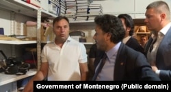 Prime minister of Montenegro Dritan Abazovic with ministers and staff in High court depot in Podgorica