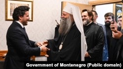 Premijer Dritan Abazović sa patrijarhom SPC Porfirijem u Podgorici, oktobar 2023.
