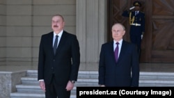 Президентите на Азербайджан и Русия Илхам Алиев и Владимир Путин (архивна снимка).