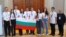 Осемте български ученици, завоювали медали, и техните ръководители 