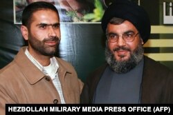 Убитият командир Уисам ал-Тауил с генералния секретар на Хизбула Сайед Хасан Насрала