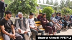 Afghans who were deported from Iran are seen in Afghanistan's western province of Herat.