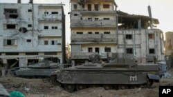 В неделя, 12 ноември, беше съoбщено, че израелски танкове са заели позиции на централните улици в град Газа