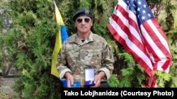 ლევან ლობჟანიძე ომში გამოჩენილი მამაცობისთვის მიღებული ჯილდოთი