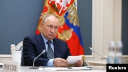 Рускиот претседател Владимир Путин присуствува на виртуелниот самит на Г20, Москва, Русија, 22 ноември 2023 година.