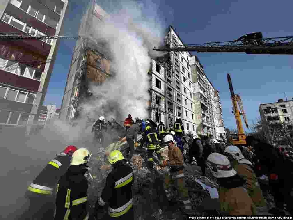 Rescuers worked throughout the morning in Uman in hopes of finding survivors who are still trapped in the rubble. On Twitter, Ukrainian President Volodymyr Zelenskiy condemned the strikes, calling the attacks a &quot;night of Russian terror.&quot;