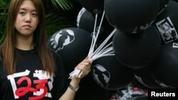 Prodemokratske demonstracije u Hong Kongu protiv člana 23 Osnovnog zakona. Aktivisti su govorili kako će usvajanje ovog zakona umanjiti građanske slobode, juni 2003. 