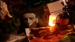 As Navalny Is Buried In Moscow, Supporters Abroad Pay Tribute