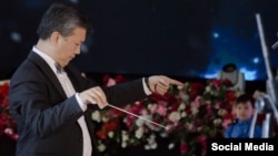 Эрнис Асаналиев.